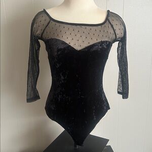 Elegant velvet and polka dot mesh bodysuit with snaps made by Charlotte Russe
